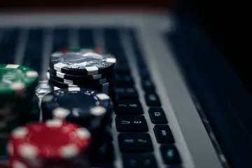 A cheerful woman in traditional clothing using her smartphone during a festive moment, showing how easily the PARIPULSE app fits into everyday life.