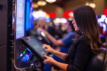 A dramatic shot of winning sevens landing on a slot reel surrounded by shining gold coins, symbolizing big wins.