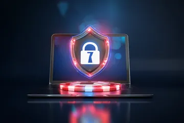 A laptop glowing with a bright login prompt in a minimalistic setup, symbolizing the protected access system at PARIPULSE.